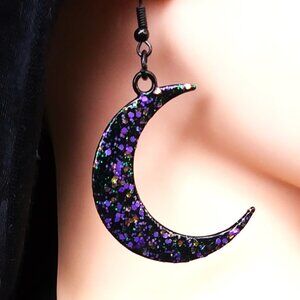 Black crescent moon earrings with purple, green and gold sparkle enamel